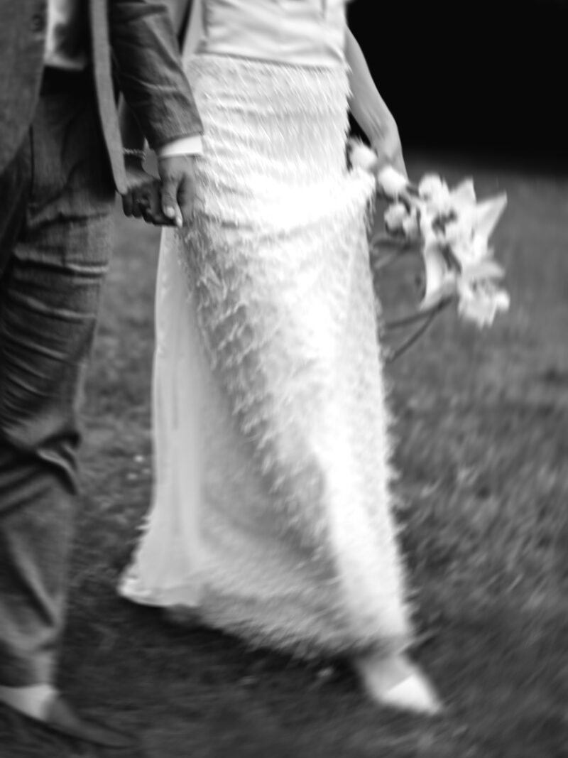 Couple embracing between colonnades